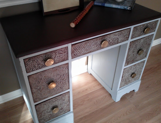 salvaged wood desk with faux leather top and bubble wrap plaster texture