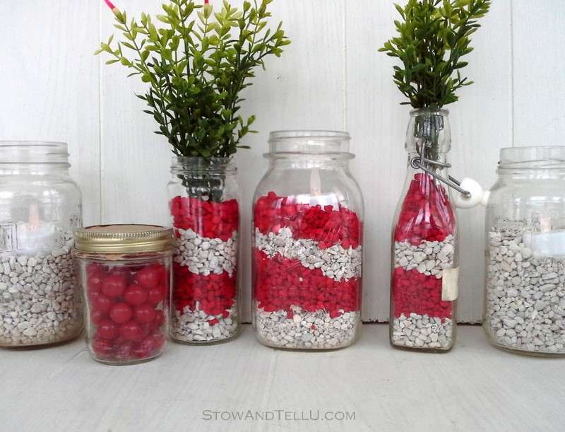 Simple decor idea using fish tank gravel. Use red and white for Valentines Day. You can also fill jars with sour cherries or red hots - Stow and TellU