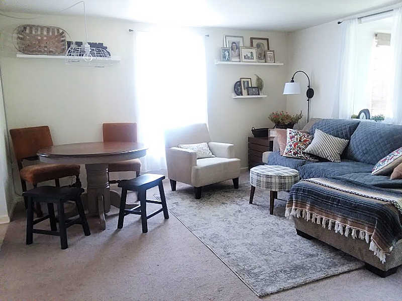 Living Room with Antique White walls, gray and brown accents