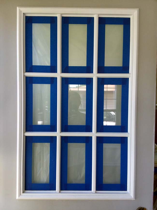 Grid Window Lites on door taped for painting | 10 Tips to Painting Grid Doors and Frosting the Glass Windows