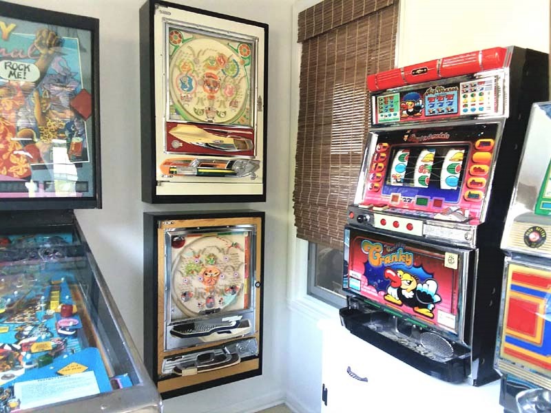 Small Arcade Room with French Cleat Mounted Pachinko Cabinets | stowandtellu.com