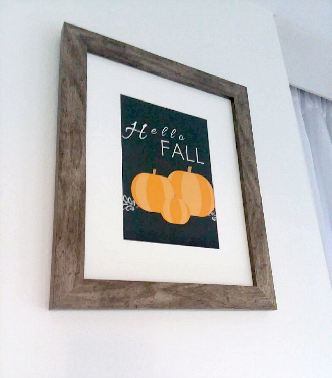 Framed "Hello Fall" Printable black background, orange pumpkins, white text | stowandtellu.com