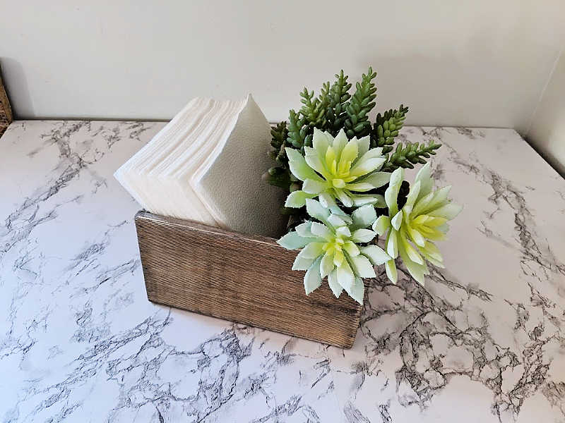 Napkin holder on marble countertop