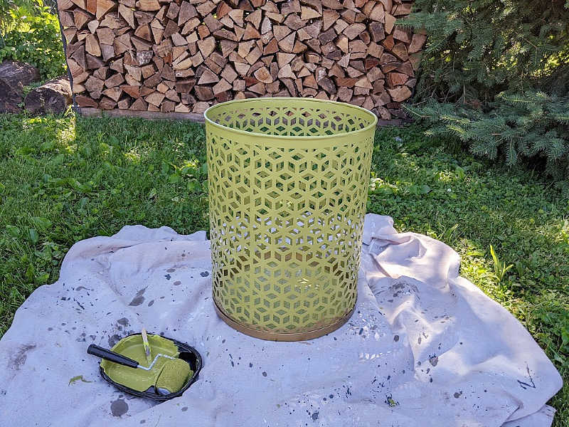 Green painted metal round side table, paint and roller