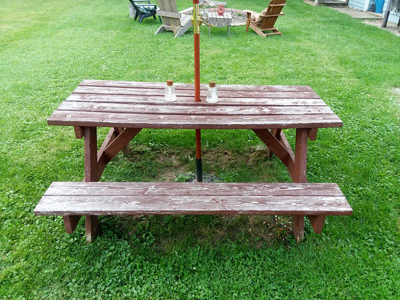 picnic table with worn-out finish