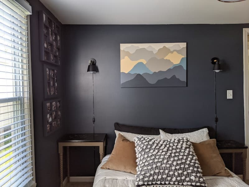 dark blue bedroom with plugin lamps