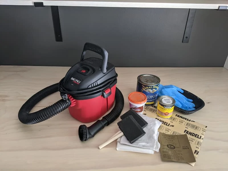 shop vac, pickling stain, sandpaper, foam brushes, rags