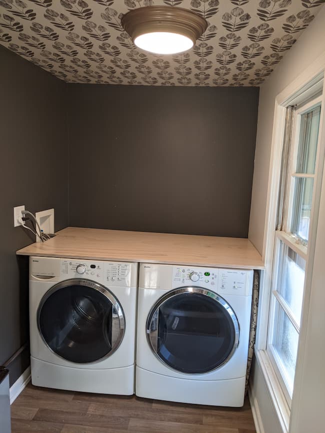 Whitewashed plywood laundry counter top