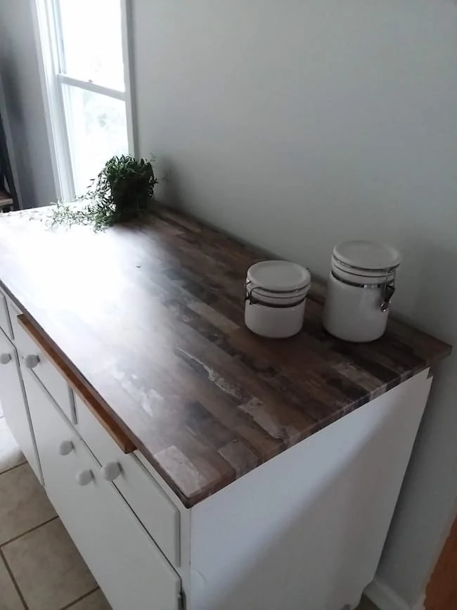repurposed older cabinet as a side board in your kitchen